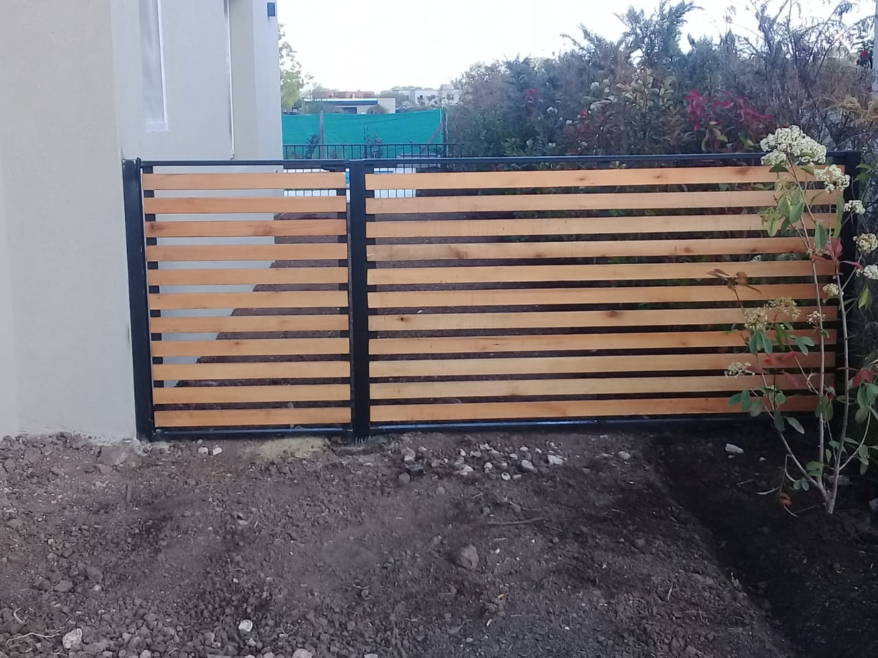 herreria pergolas de hierro y madera